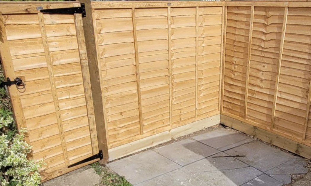 New featheredge fence panels and gate installed by Lawn Ranger Landscapes